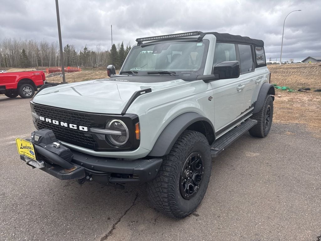 2021 Ford Bronco Wildtrak in Cactus — front three-quarter view
