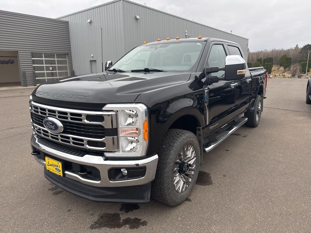 2023 Ford F-250SD XLT in Black Metallic — front three-quarter view
