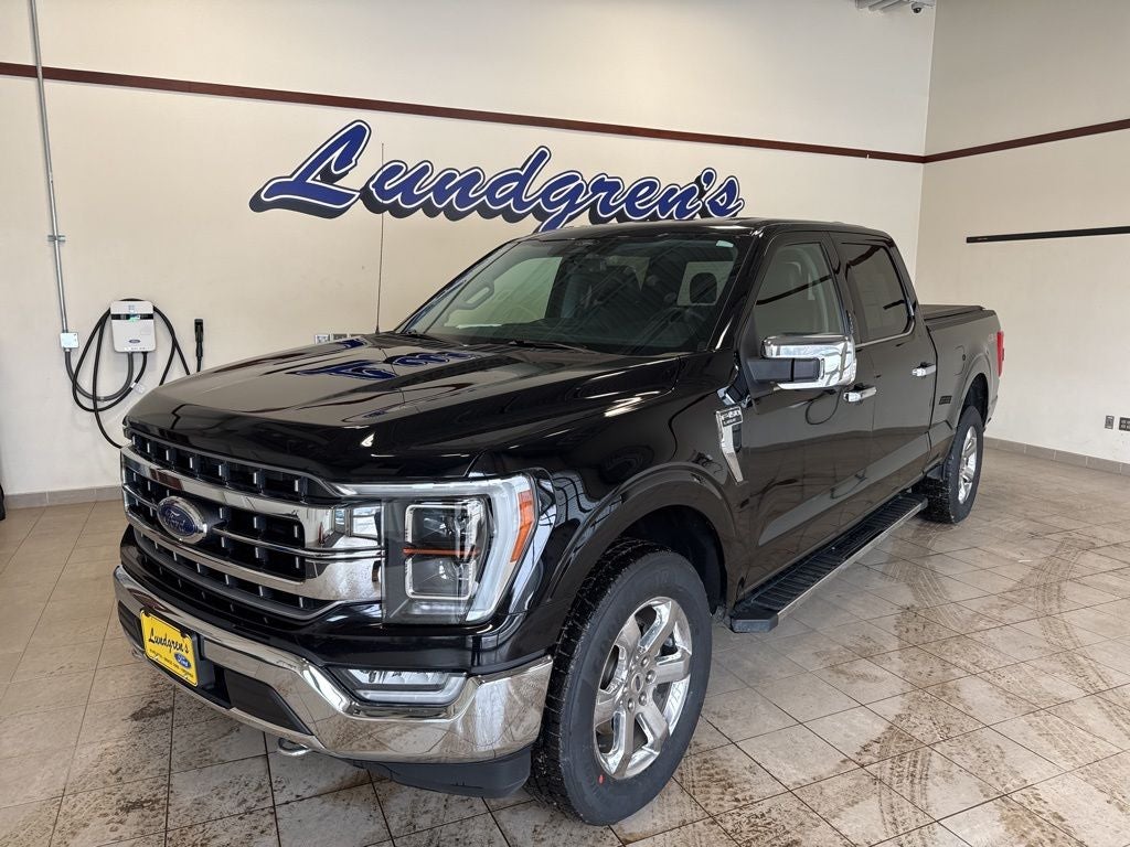 2021 Ford F-150 Lariat in Black Metallic — front three-quarter view
