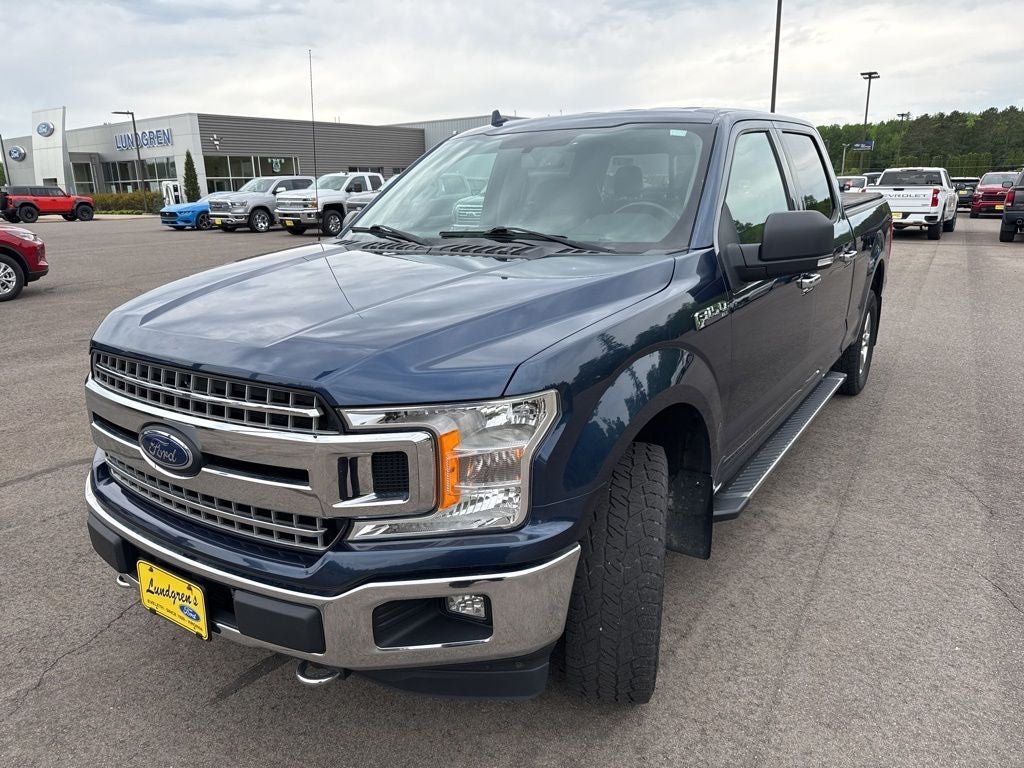 2018 Ford F-150 XLT in Blue Jeans Metallic — front three-quarter view