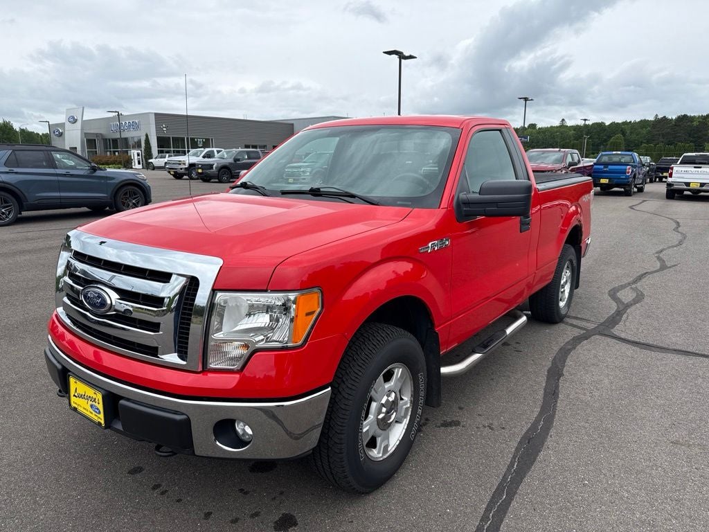 2012 Ford F-150 XLT in Race Red — front three-quarter view