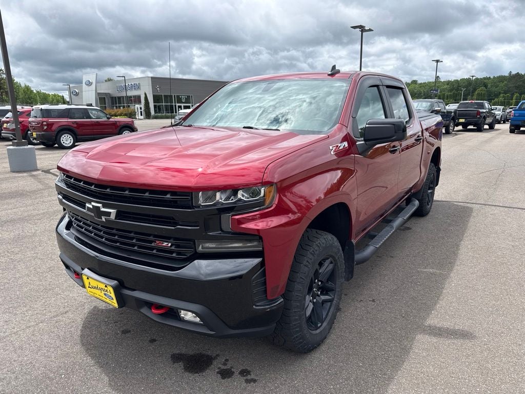 2019 Chevrolet Silverado 1500 LT Trail Boss in Cajun Red Tintcoat — front three-quarter view