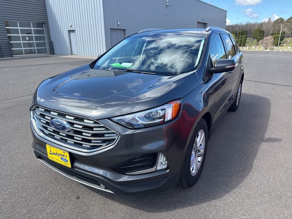 2019 Ford Edge SEL in Magnetic Metallic — front three-quarter view